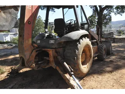 LOTE 010 - RETRO CASE 580 L - ANO 1997