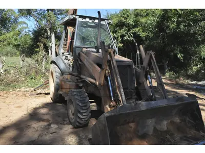 LOTE 010 - RETRO CASE 580 L - ANO 1997