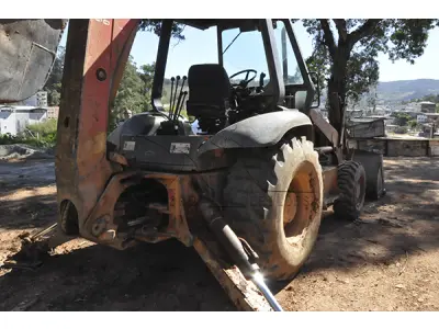 LOTE 010 - RETRO CASE 580 L - ANO 1997